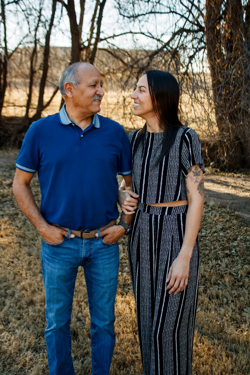 A father and daughter during an extended family photo session at The League House in Amarillo, Texas