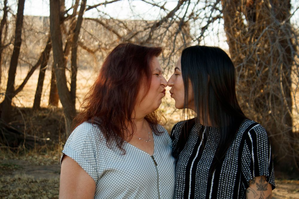 A mother and daughter during an extended family photo session at The League House in Amarillo, Texas