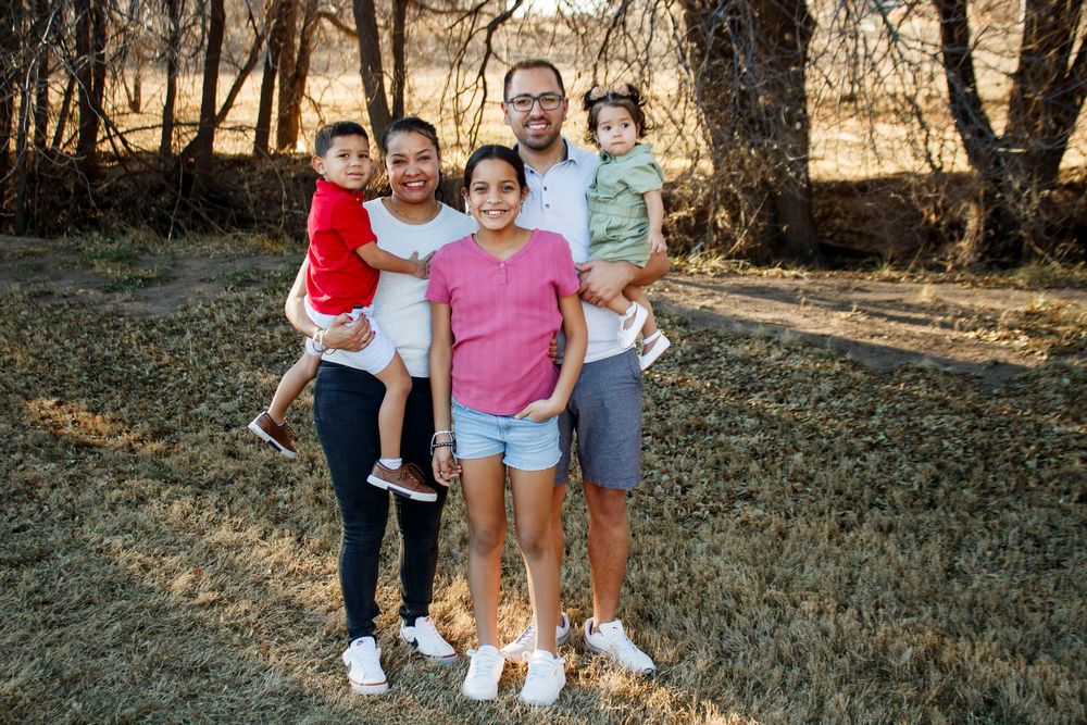 A family of five during an extended family photo session at The League House in Amarillo, Texas