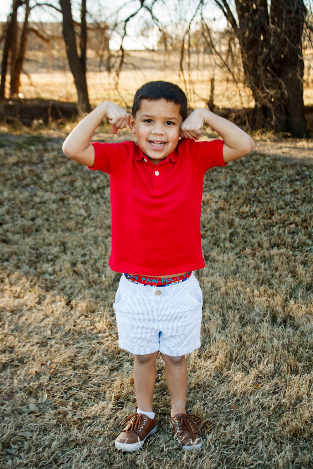 A toddler boy during an extended family photo session at The League House in Amarillo, Texas
