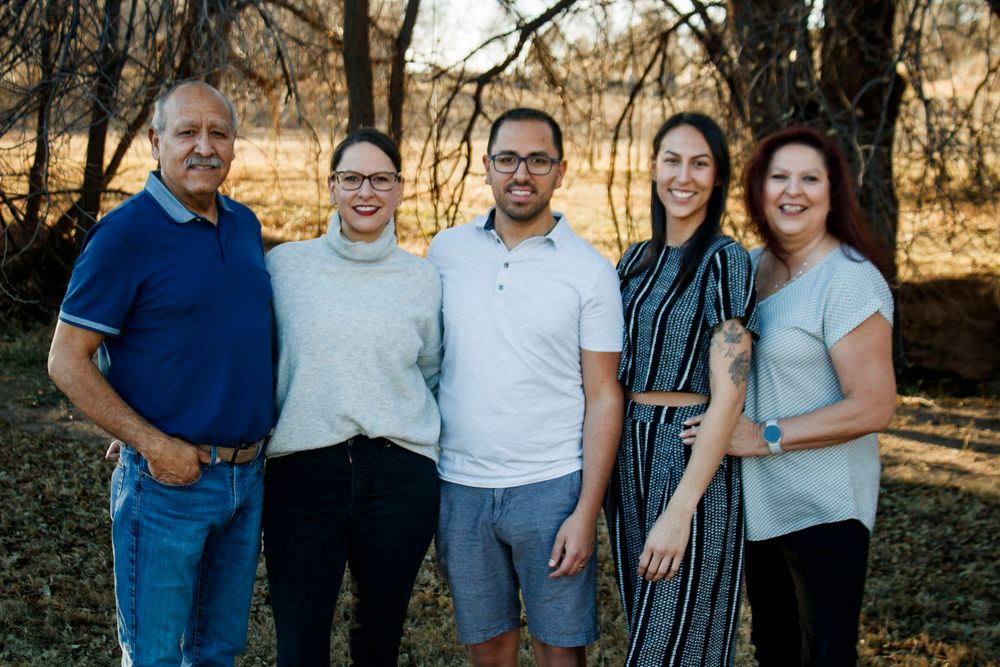 A family of five during an extended family photo session at The League House in Amarillo, Texas