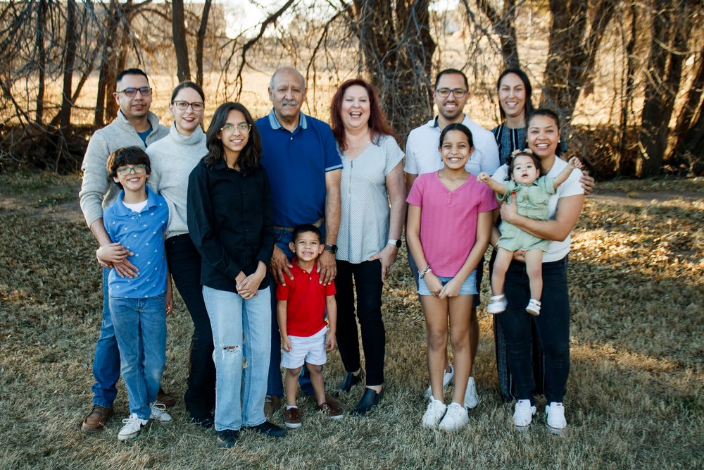 A family of twelve during an extended family photo session at The League House in Amarillo, Texas