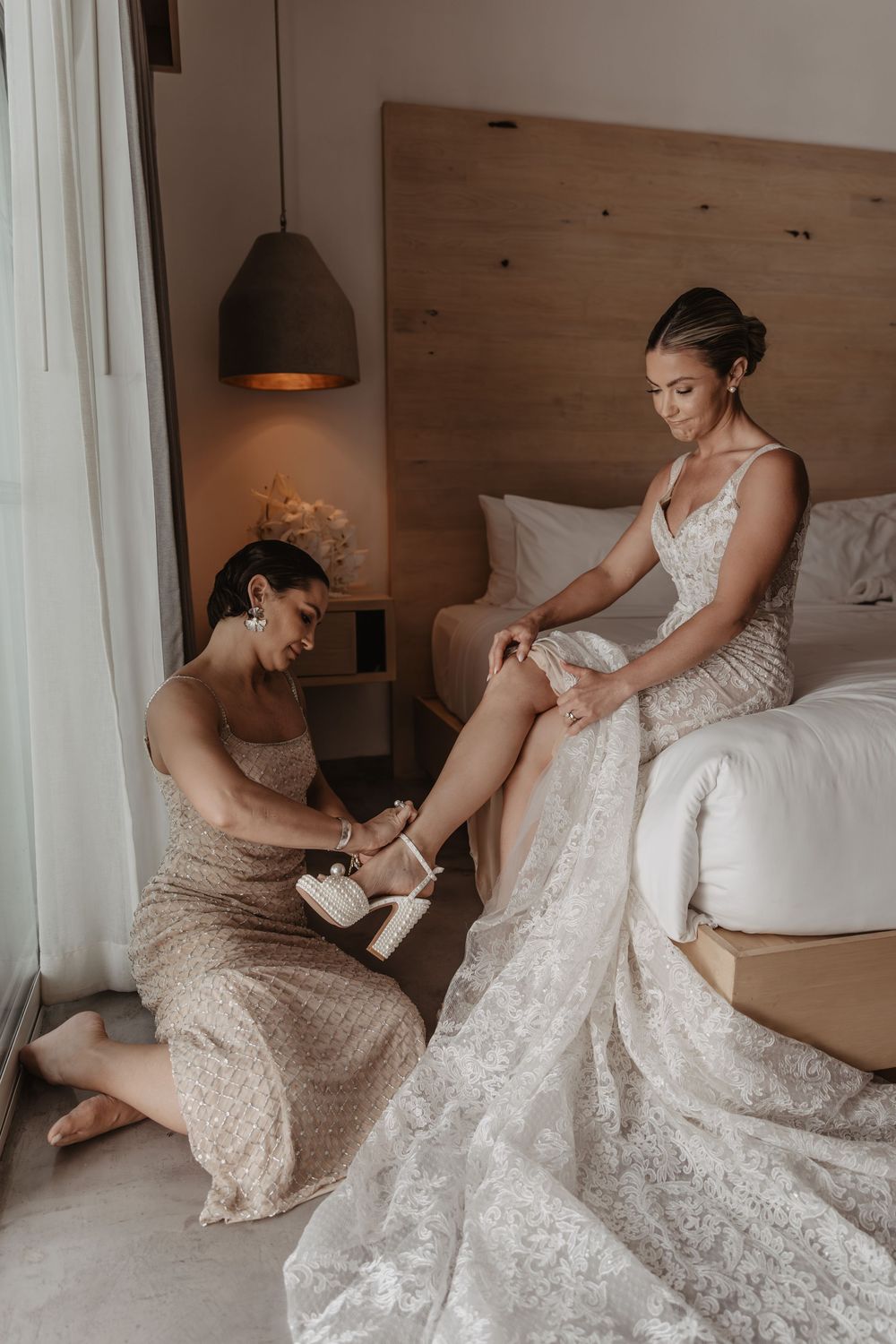 A sequence of getting ready moments showing someone putting on elegant white lace wedding shoes and dress.