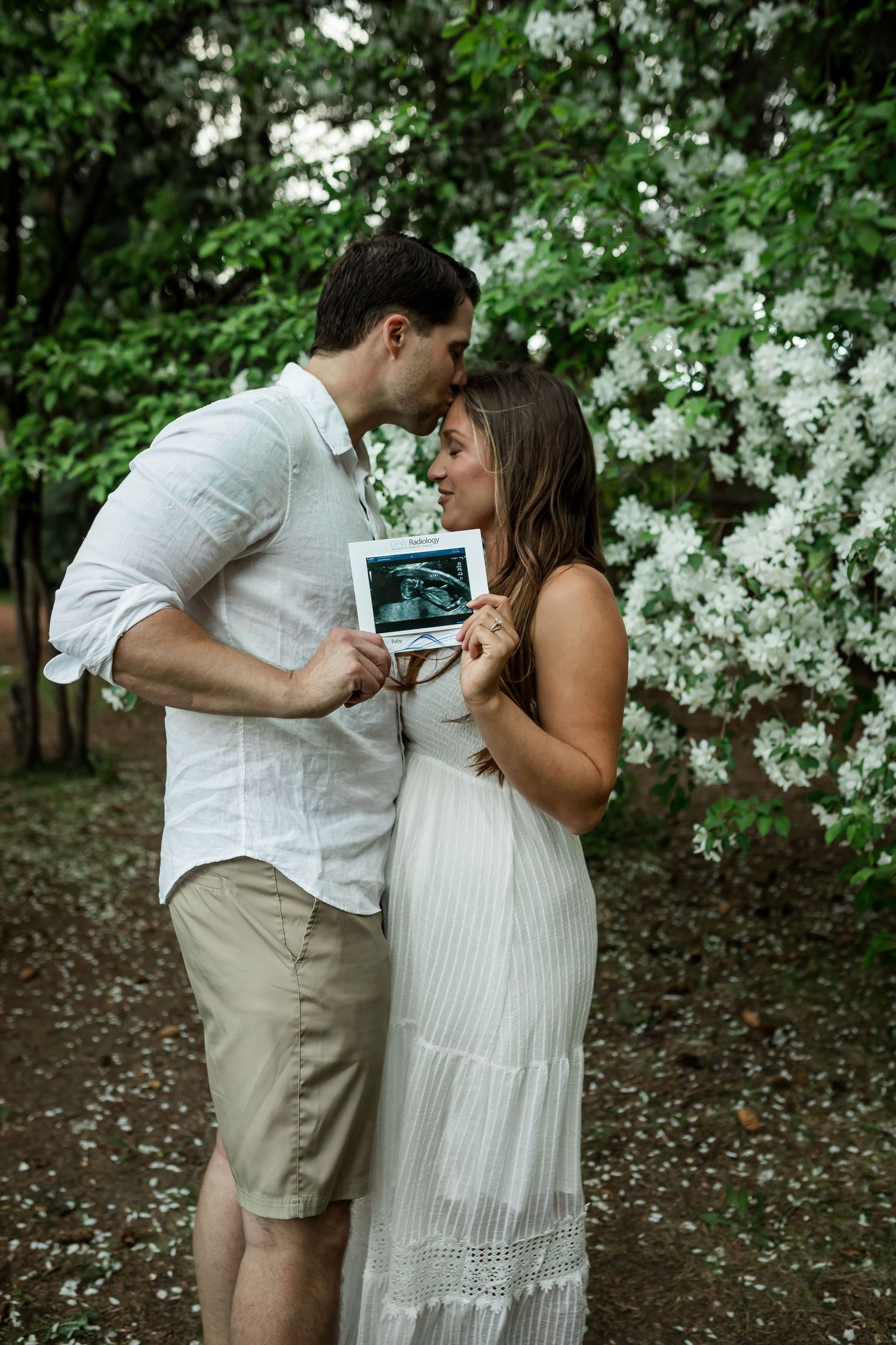 Family photos in sunflower fields at Bowden SunMaze by Calgary lifestyle photographer, Love & Sunshine Photography.