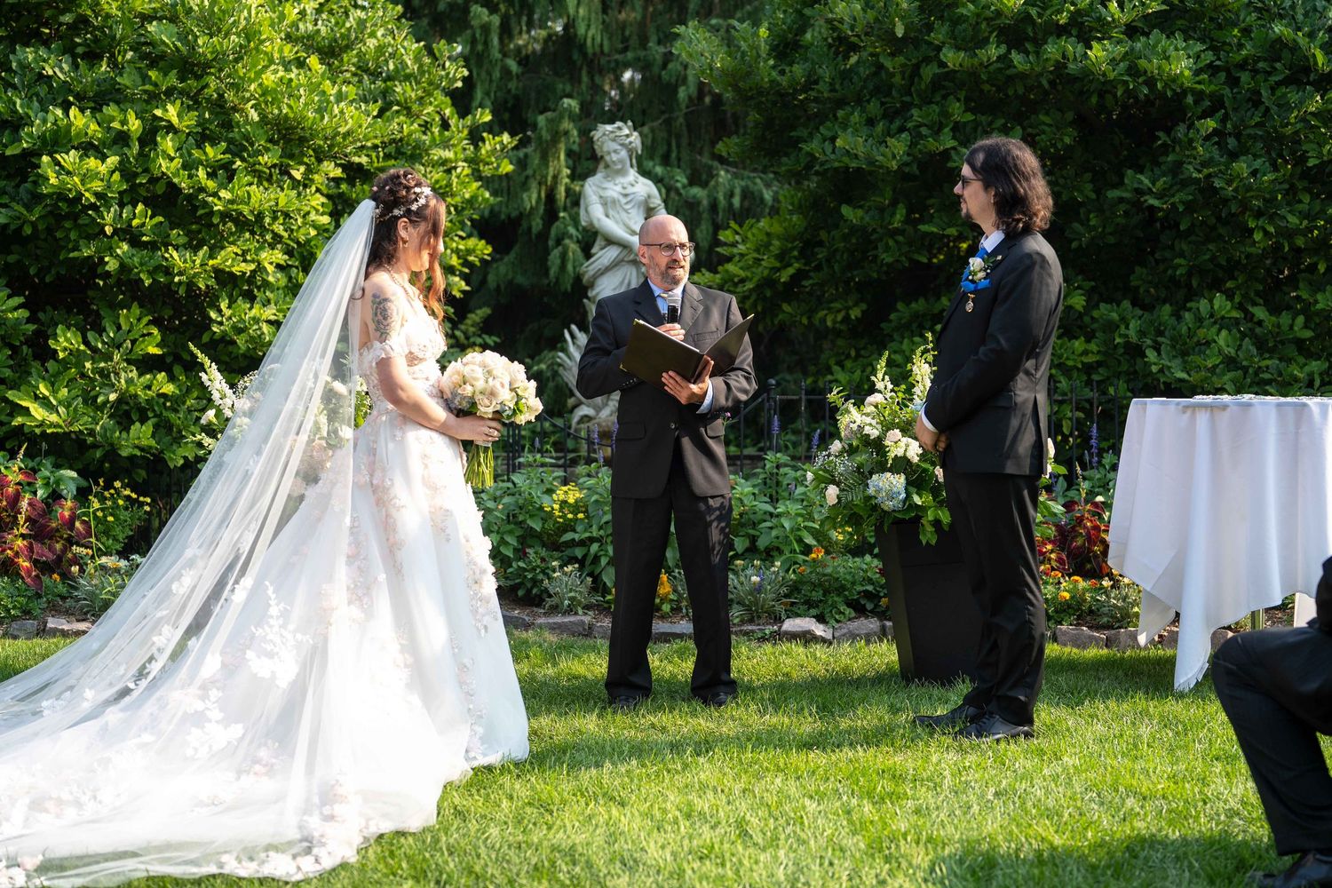 Outdoor garden wedding ceremony at Toledo Zoo Wedding Venue