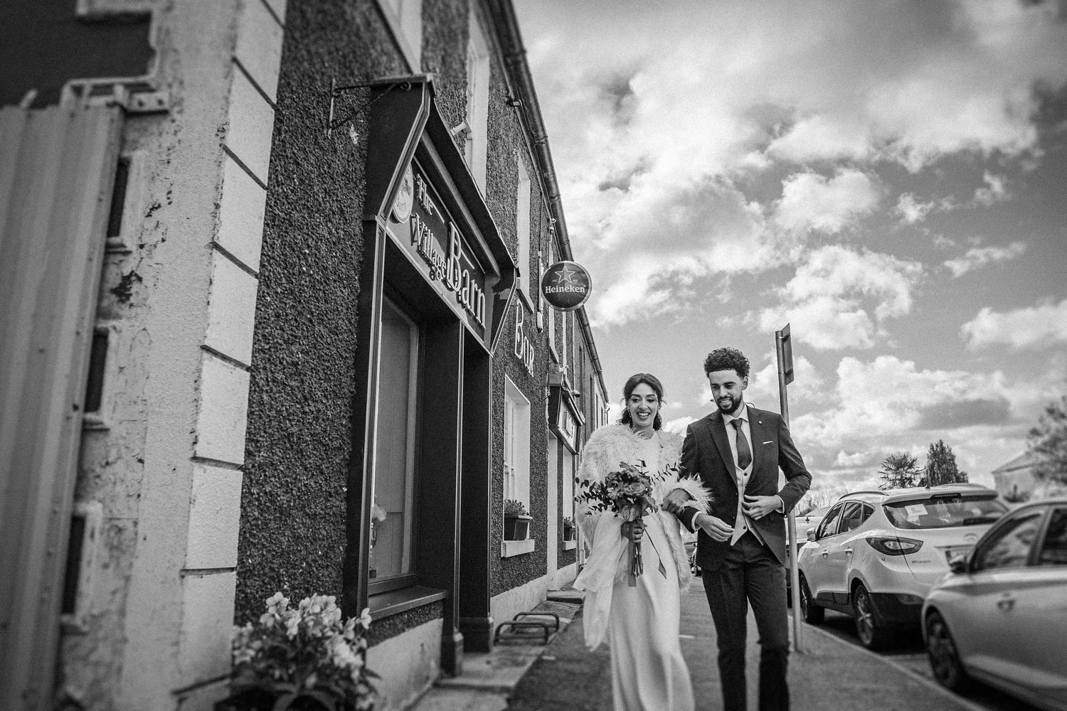 Black and white wedding photography collage showing candid moments and architectural details of the venue.
