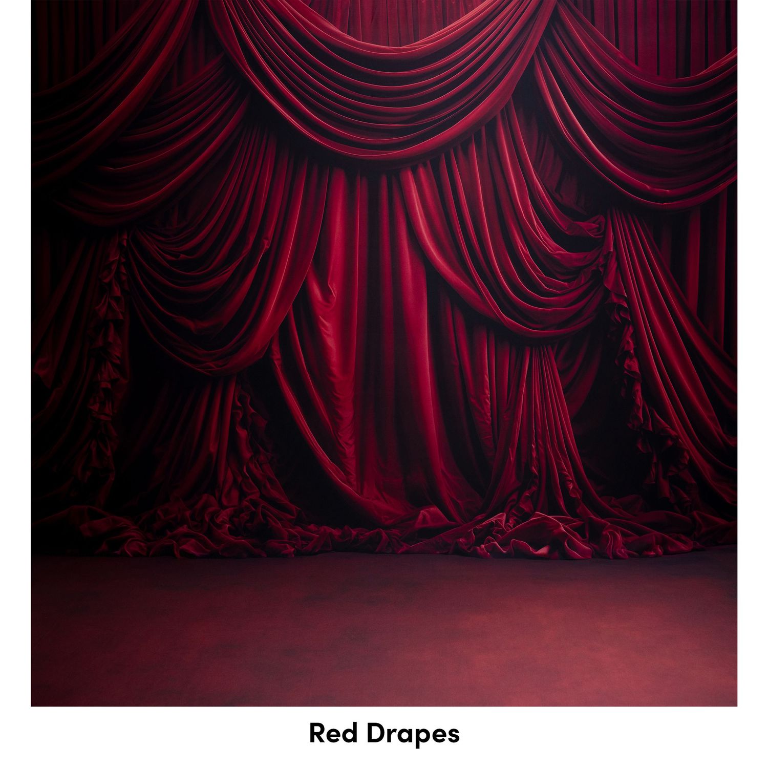 Elegant red velvet stage curtains with dramatic draping and layered swags create a luxurious theatrical backdrop.