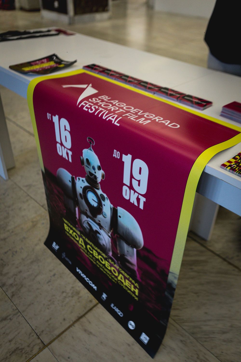 Blagoevgrad Short Film Festival poster featuring robot, October 16-19 event.