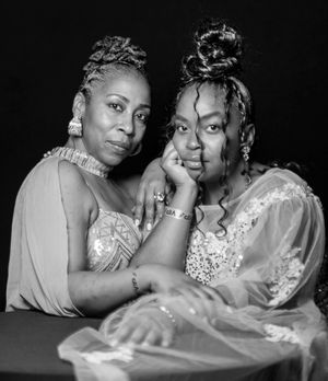 A series of intimate black and white photos showing a couple posing together in romantic poses.