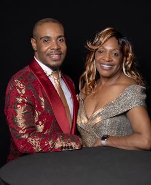 A series of romantic portraits featuring a couple in red and silver formal wear against a dark background.