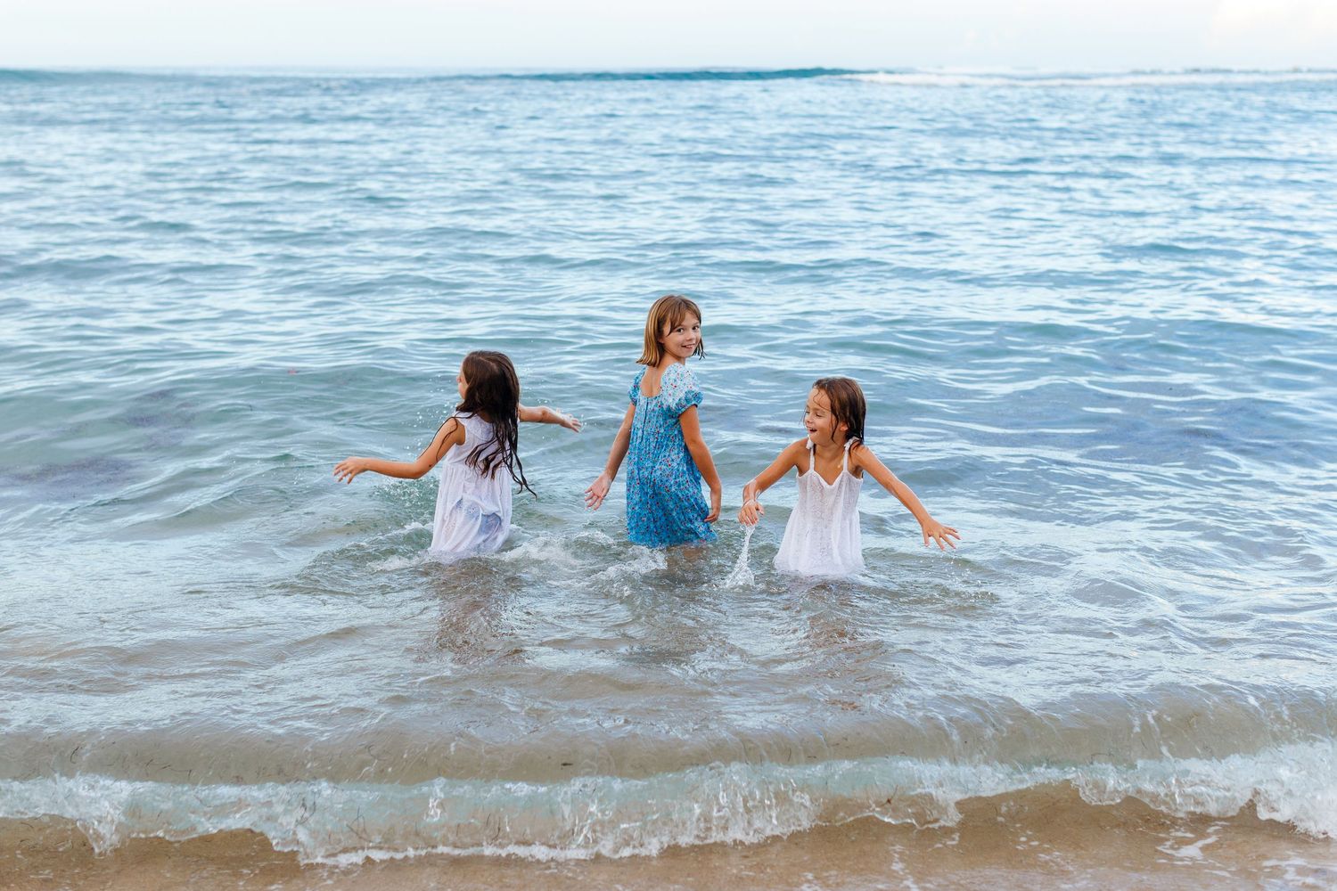 Three girls at the beach in Dorado, Puerto Rico.