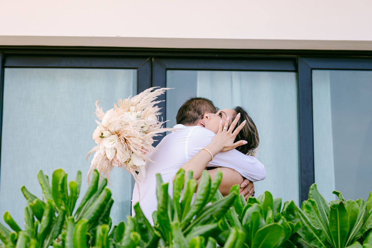 Candid Blue Venado Weddings photo – emotional bride and groom moment.