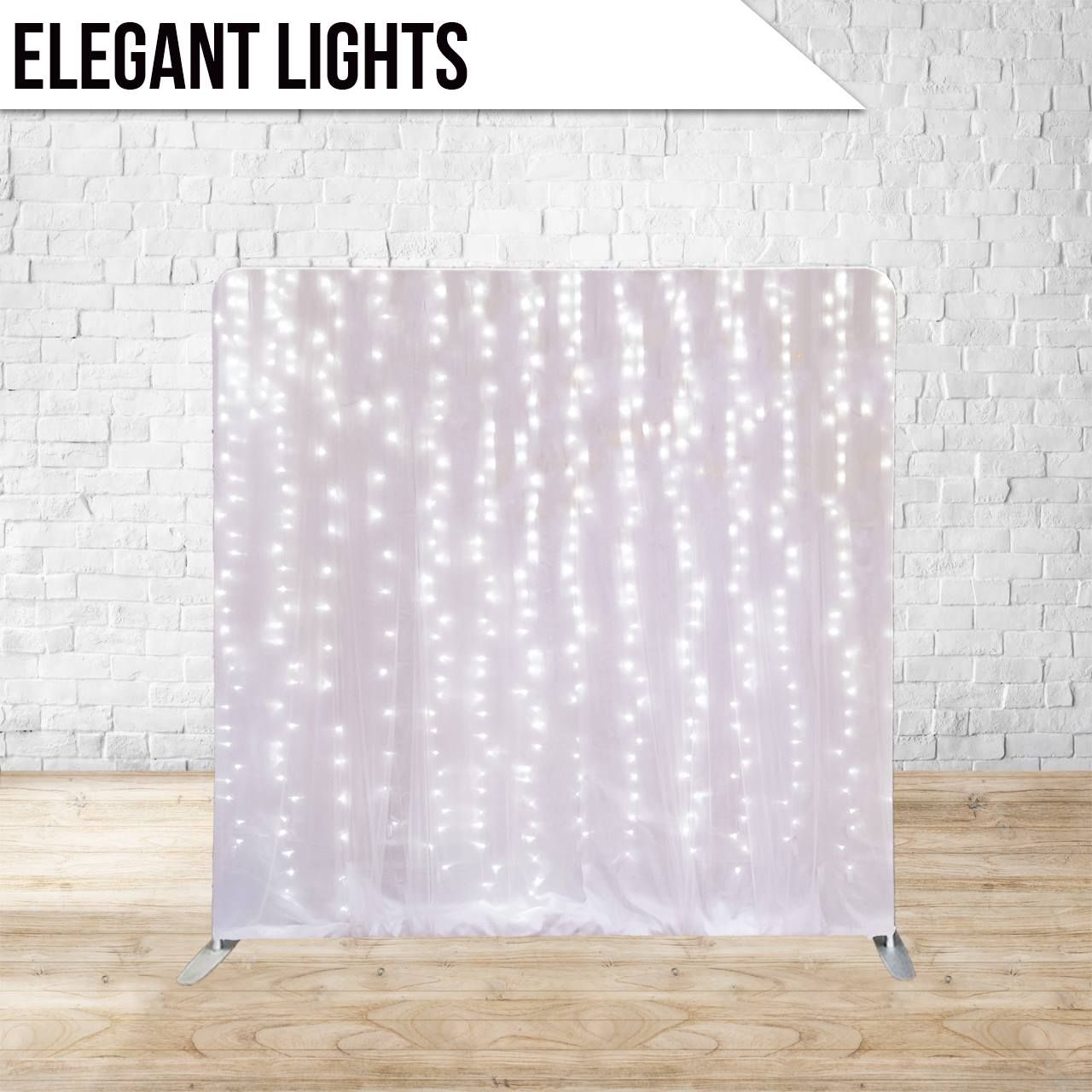 String lights create an elegant cascading curtain effect against a white textured wall with wooden flooring.