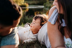 Several candid photos show people sharing tender moments together in warm sunlit scenes outdoors.