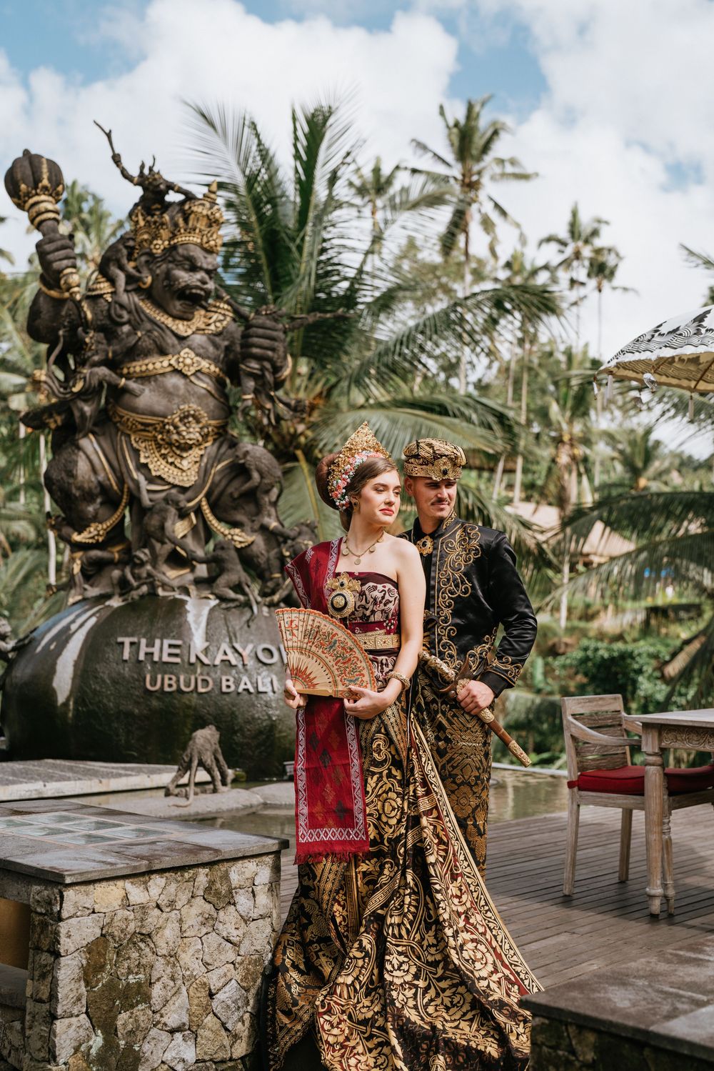 Tropical beach resort wedding photos with traditional Indonesian ceremonial attire.