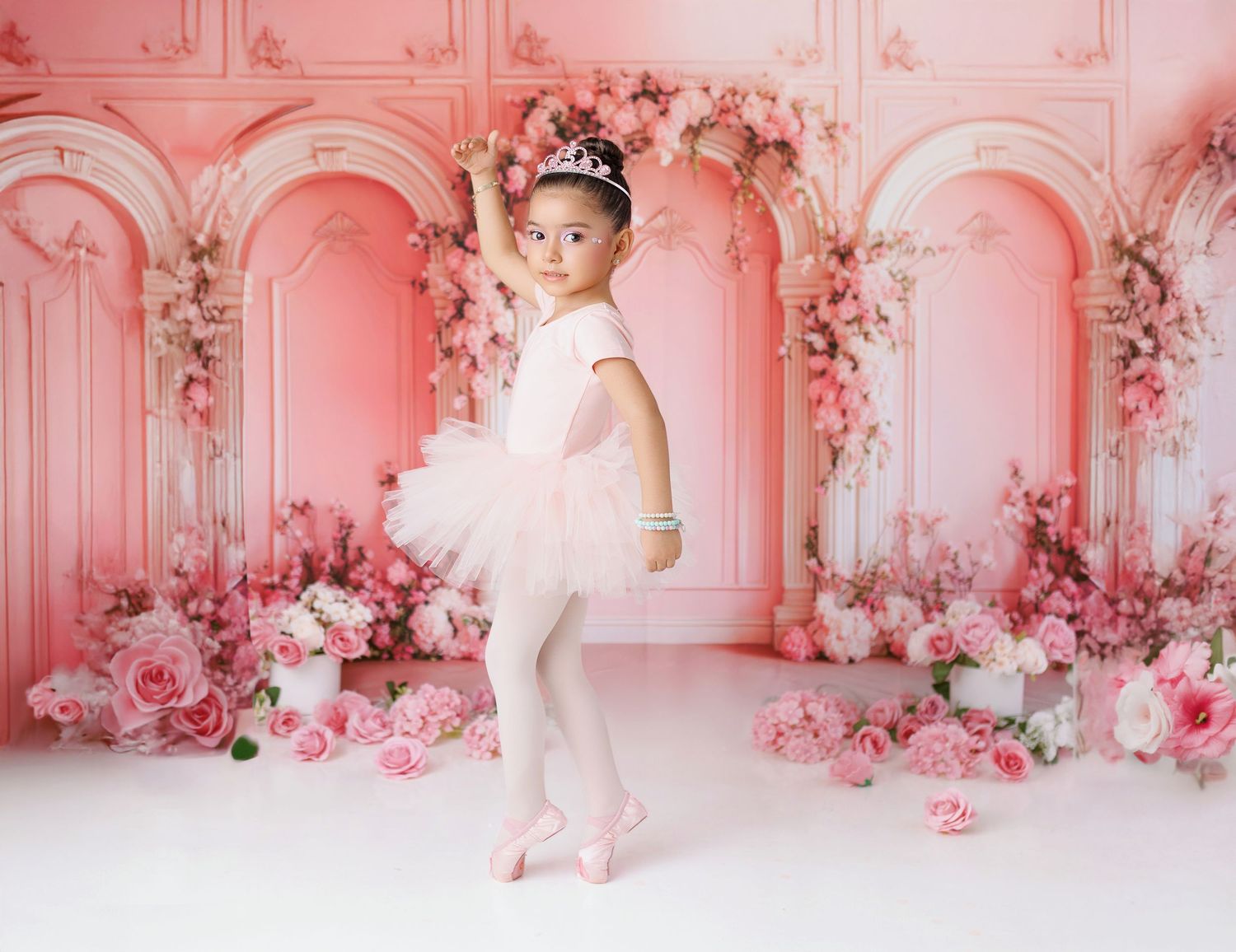 Luxurious pink baroque room interior with ornate wall moldings and romantic floral decorations.