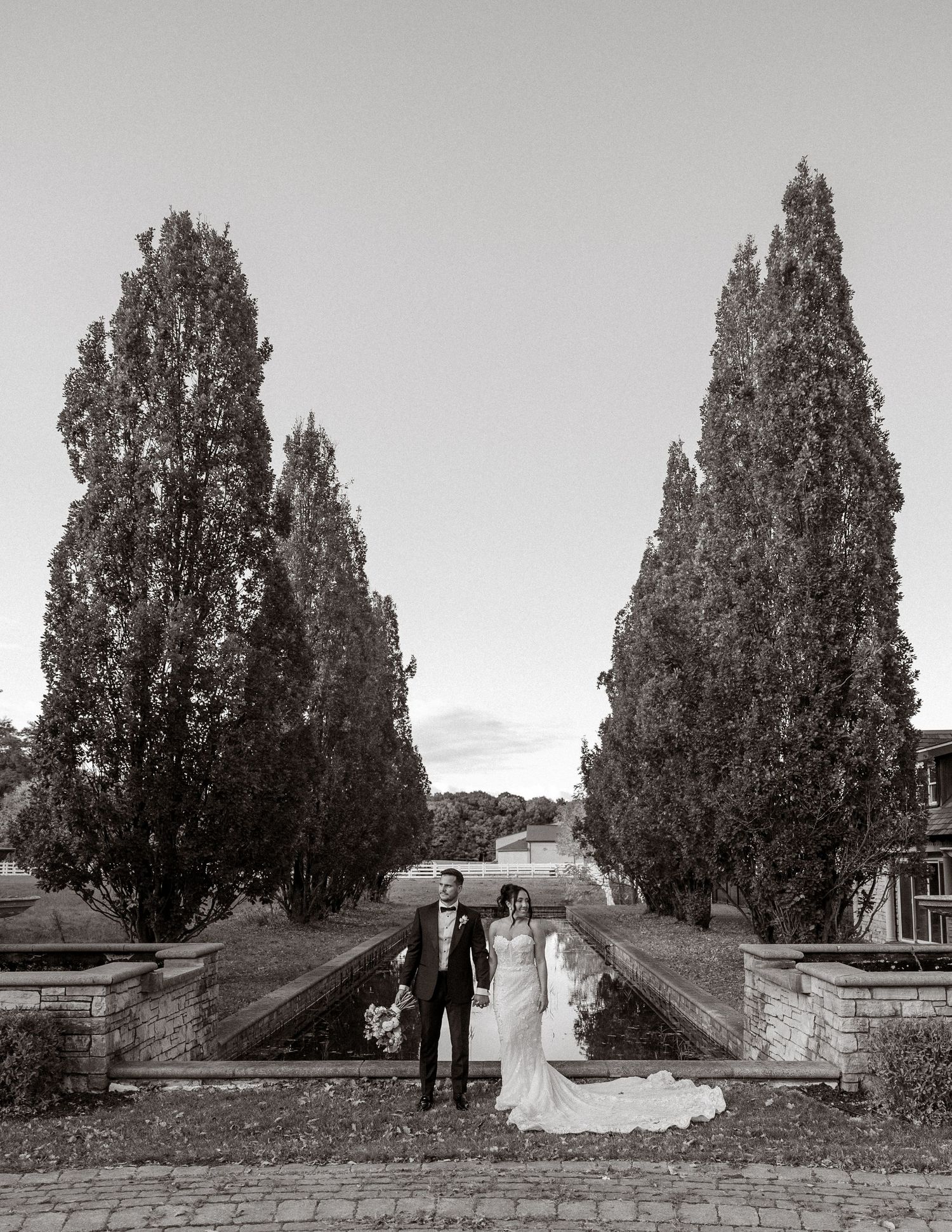 Bride and groom captured in an editorial, candid wedding moment in Ontario, Canada