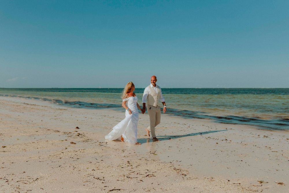Beach wedding couple sunset Zanzibar