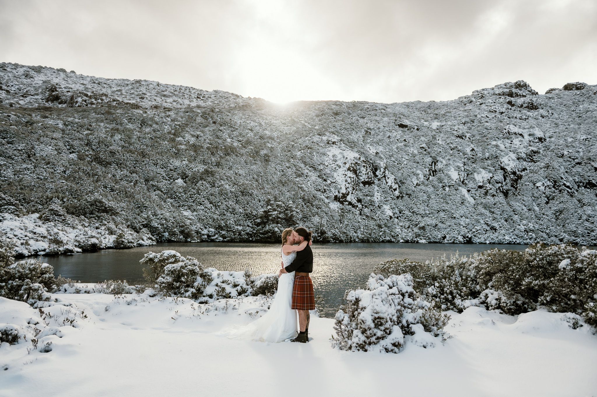 Hartz Mountain wild elopement, taken during a snow storm in Tasmania by wedding and elopement photographer Joss Jensen Photography