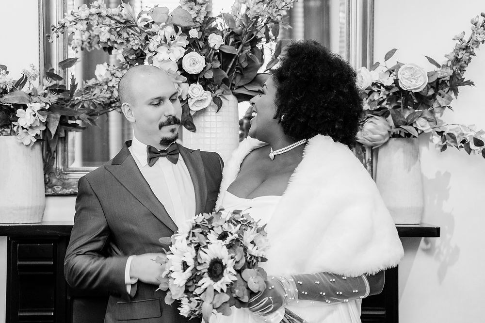 Black and white photo collage showing intimate moments between a couple during their wedding celebration.