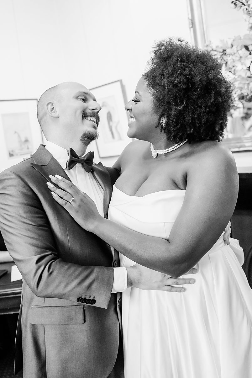 A romantic black and white photo sequence showing a couple in wedding attire sharing tender moments and laughter.