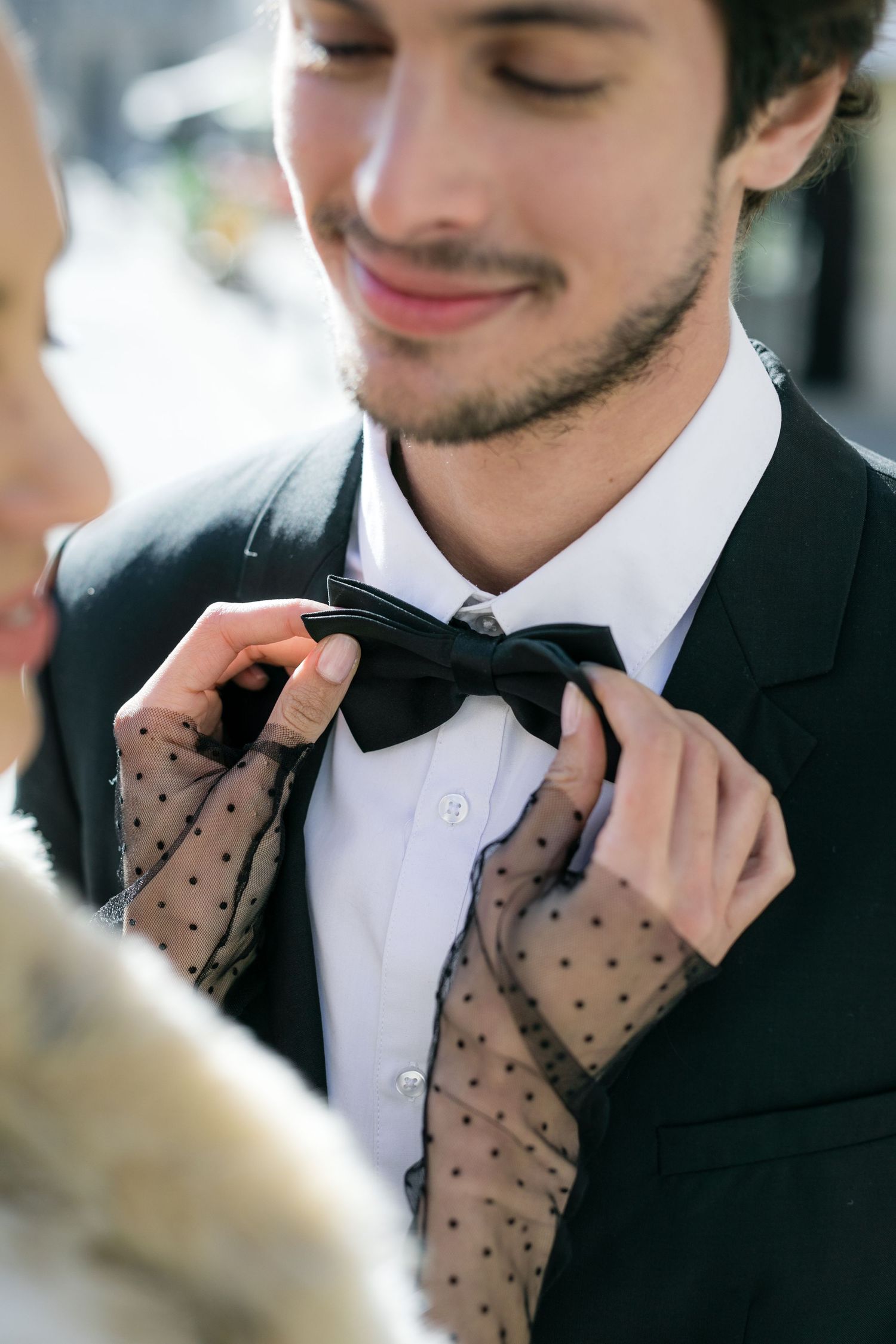 Couple hugs during Engagement Session at the old Dallas City Hall.