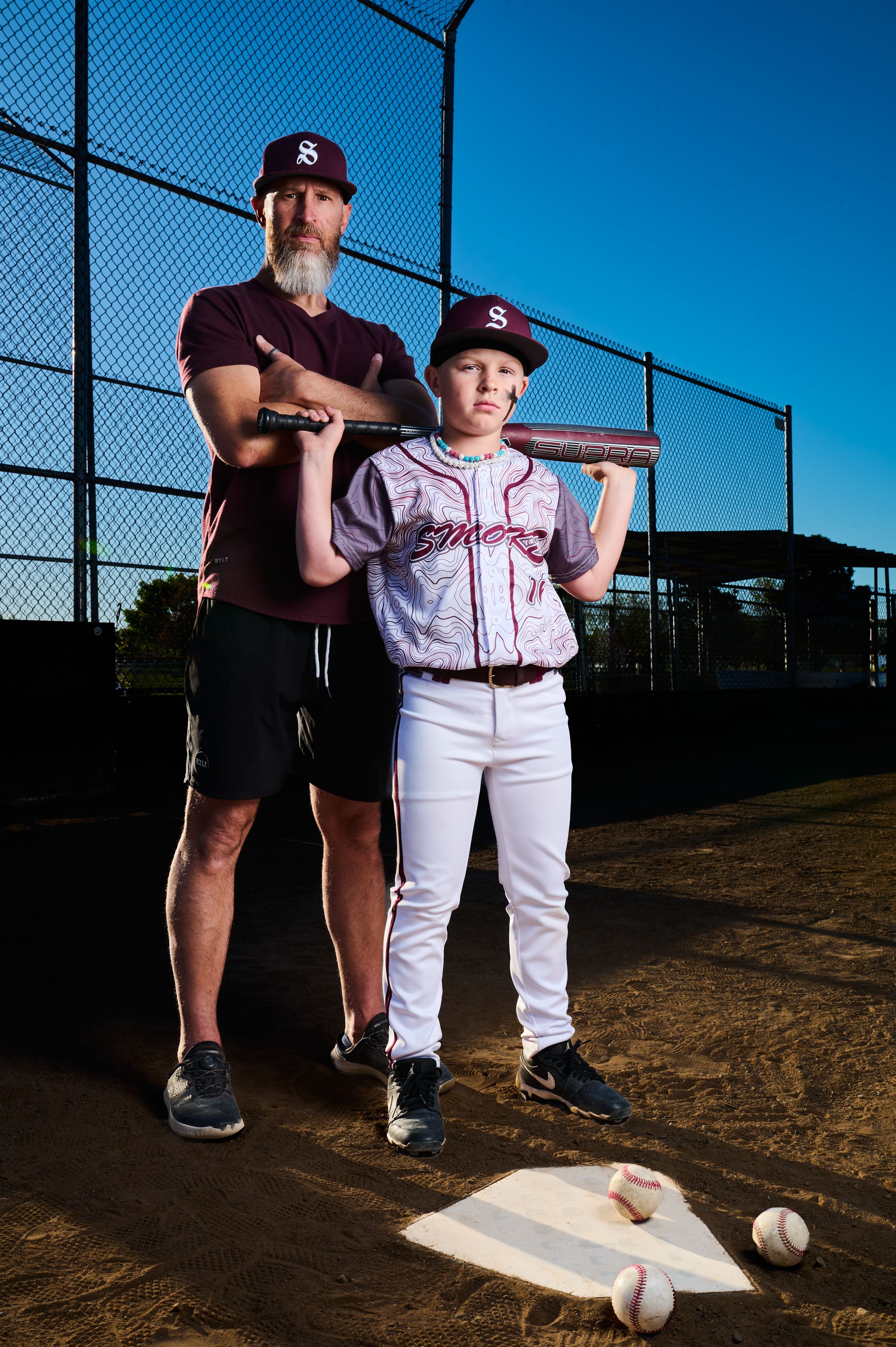 Utah Sport Photographer team Baseball SLSMoke MaxPreps Action Photos  West Jordan, Utah Coach and Son