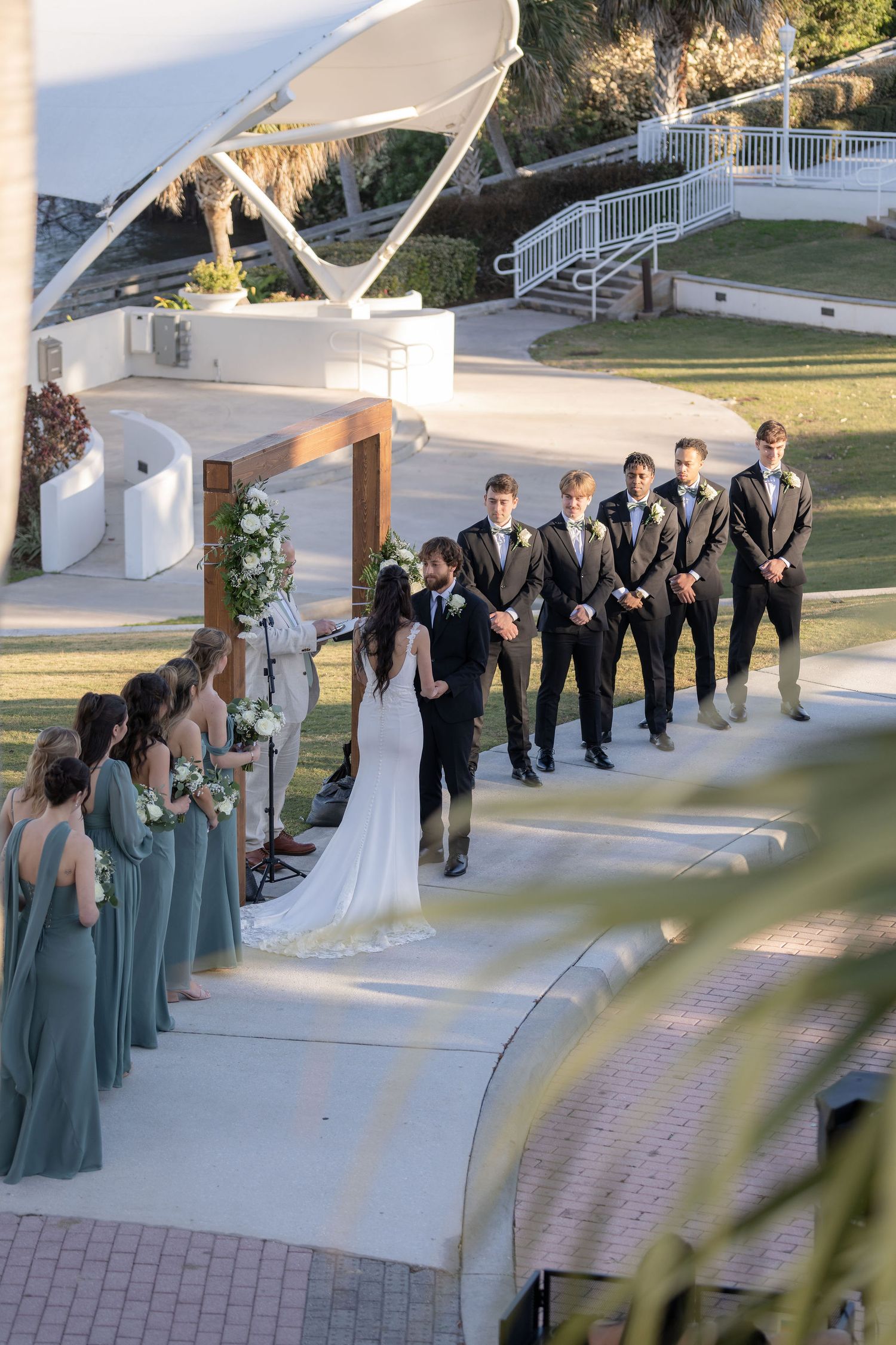 Couple at the altar during a circle driveway ceremony at the Mansion at Tuckahoe