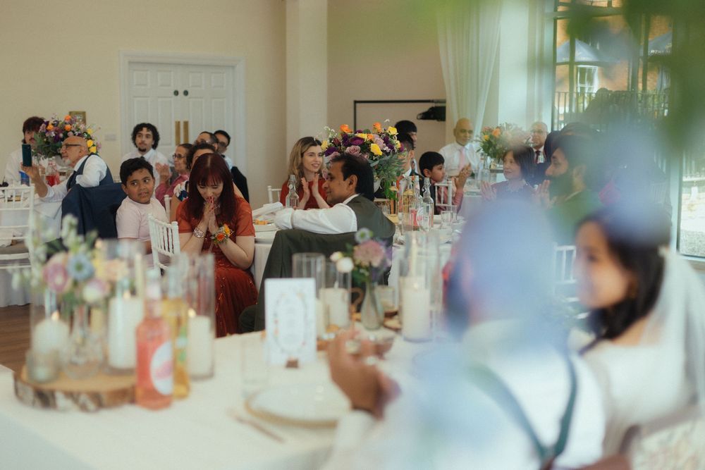 Winstanley House wedding, candid photo of mother of the bride during reception.