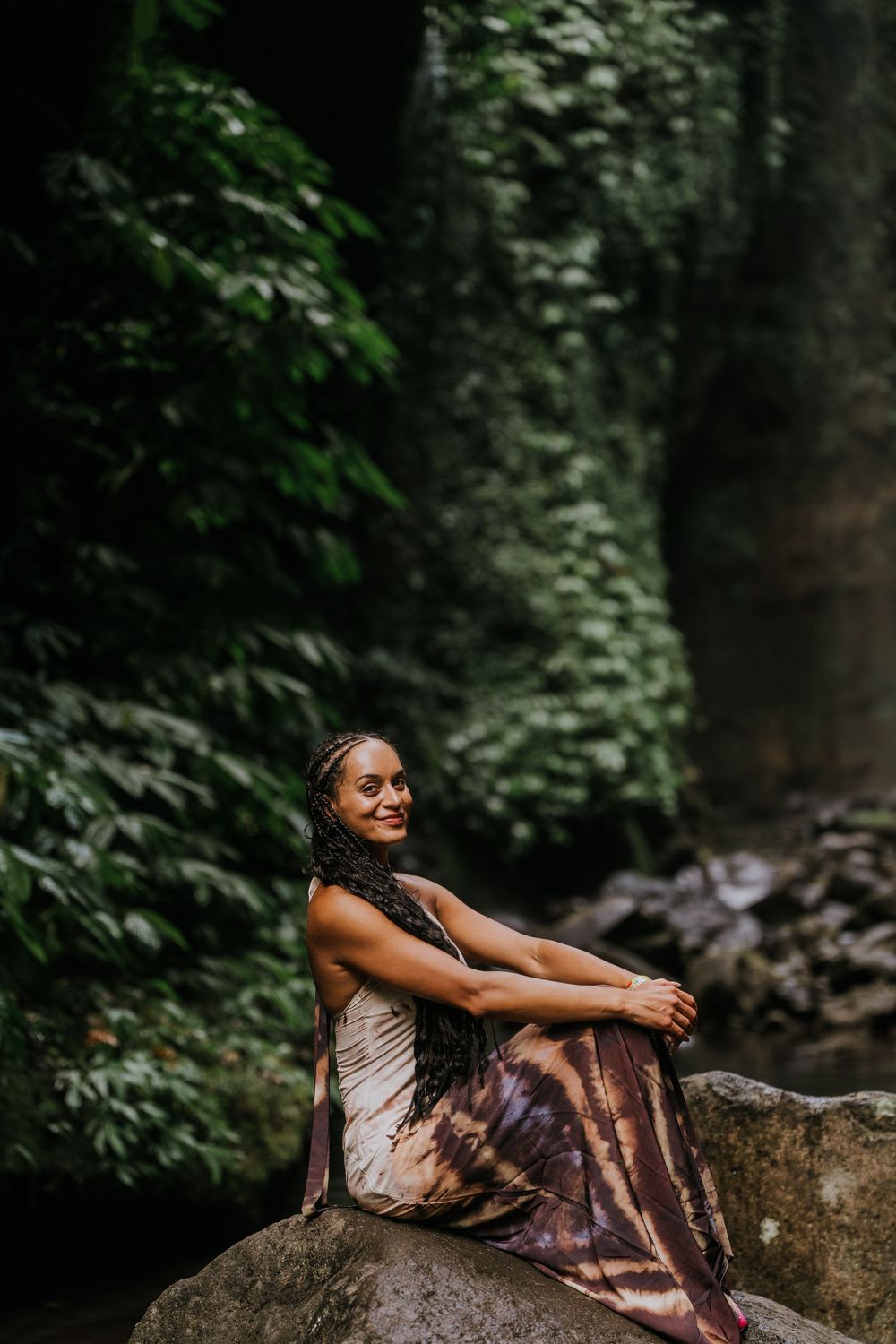 Natural family photography surrounded by tropical greenery at Sekumpul Waterfall