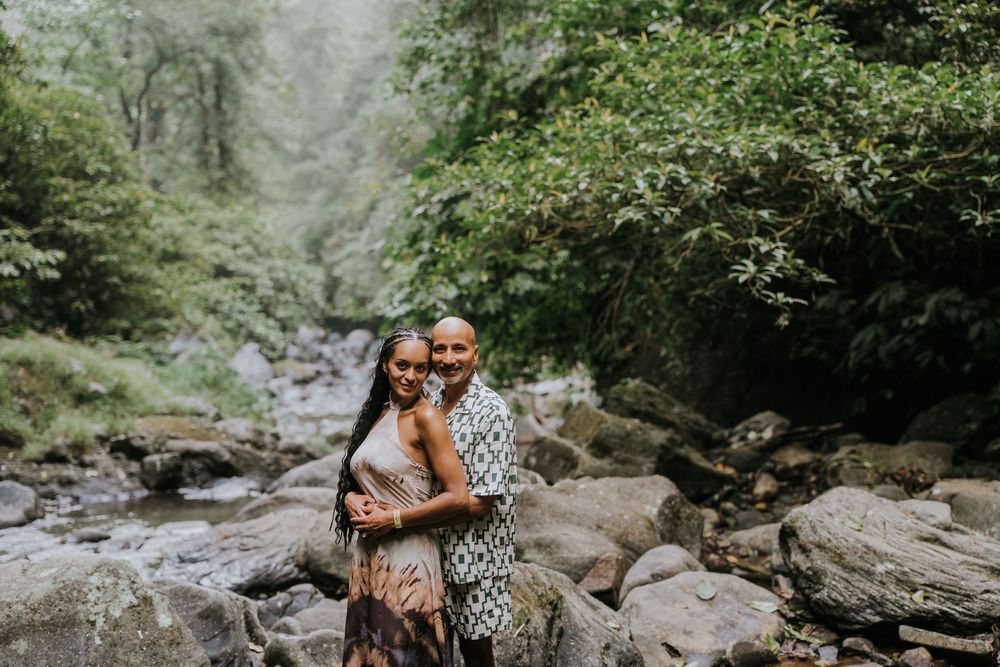 Natural family photography surrounded by tropical greenery at Sekumpul Waterfall