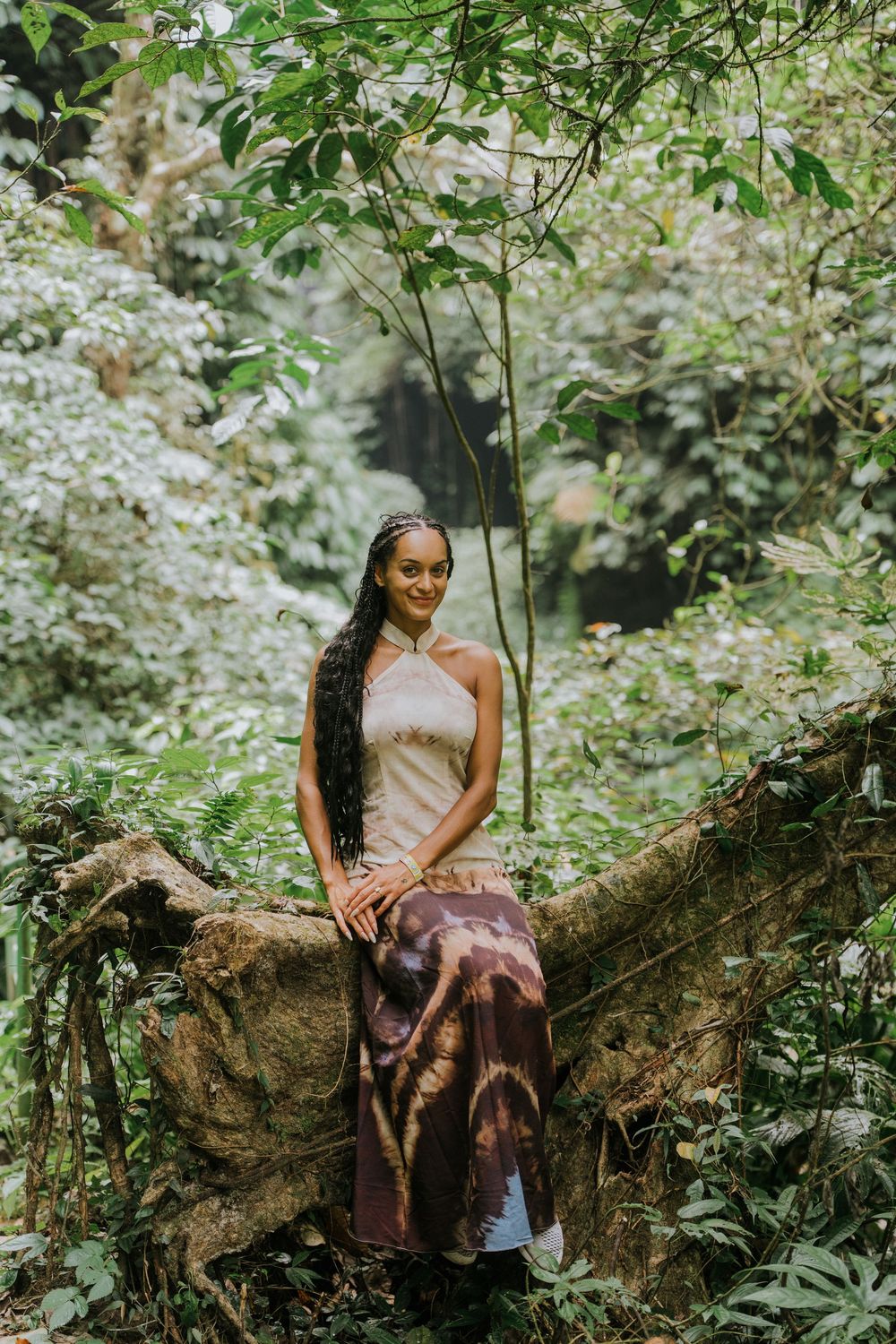 Natural family photography surrounded by tropical greenery at Sekumpul Waterfall