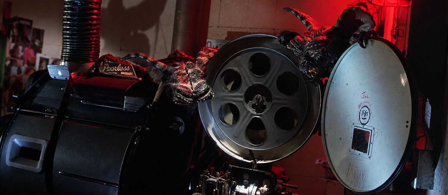 Gremlins inside the movie theater projector