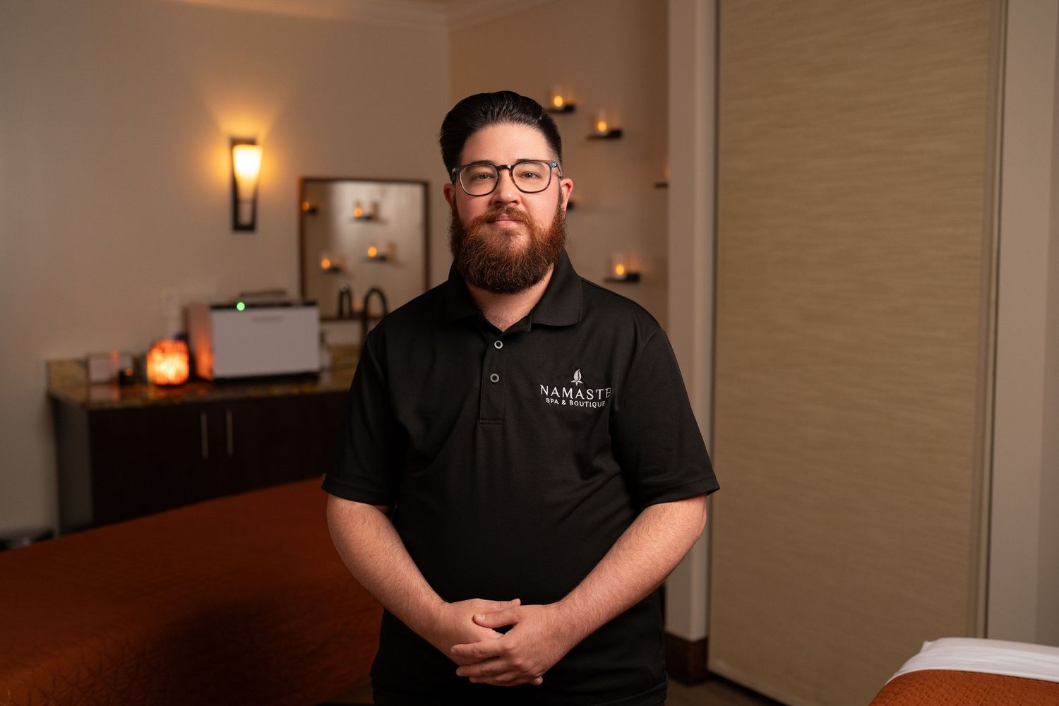 Orlando personal branding photographer Ray Alvarez — on-location business branding portrait of spa owner in branded uniform