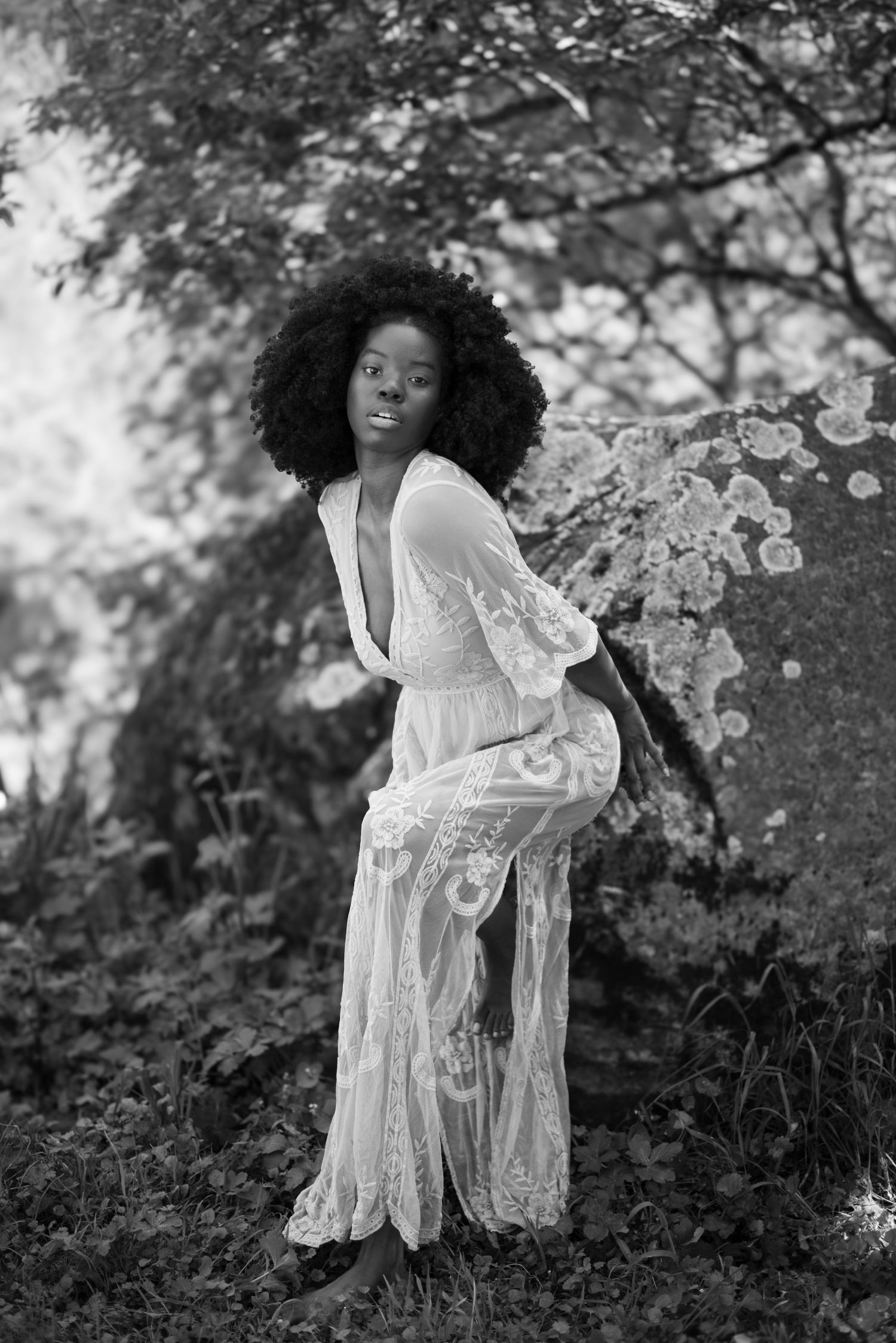 Cinematic portrait of a beautiful, fierce woman radiating confidence, strength, and effortless feminine energy in natural light.