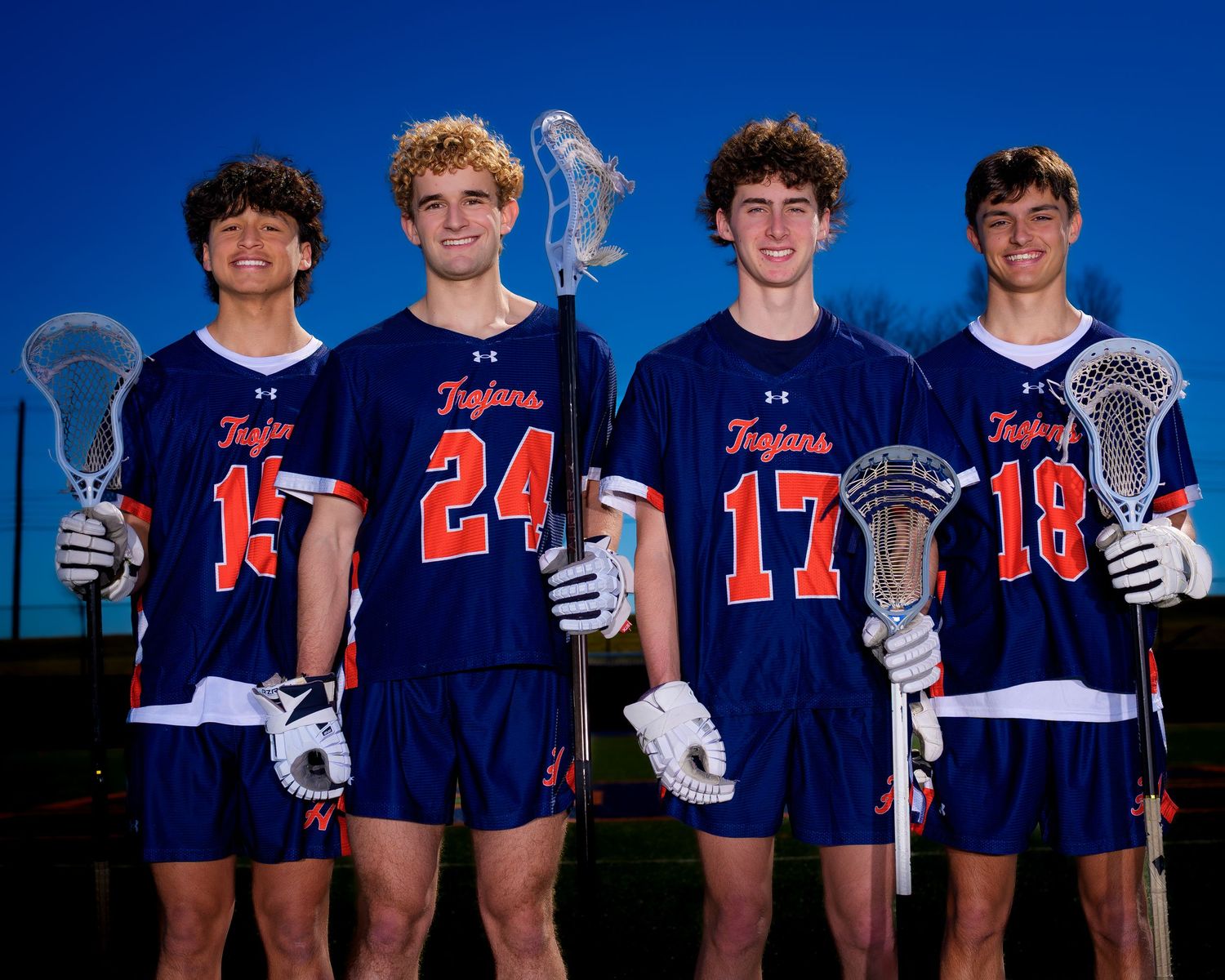 Hershey Trojans boys lacrosse players in a 2026 class photo, by Deanna Fox, SportsFox Photography based in Hershey PA