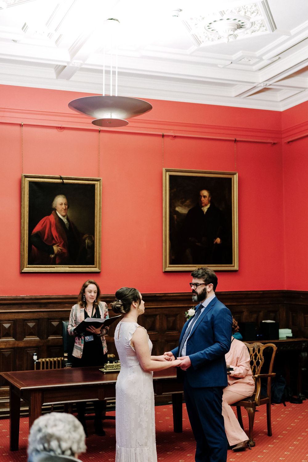 Couple exchanging vows in Corn Street registry office