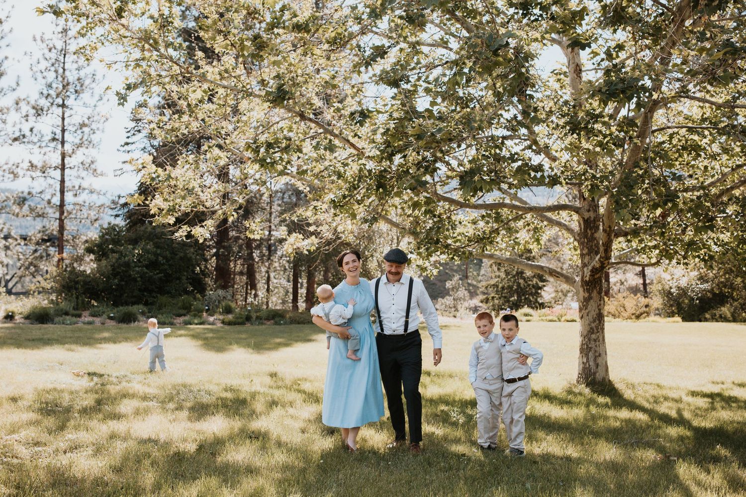 South Okanagan generations photography session featuring multiple family members in a natural garden setting.