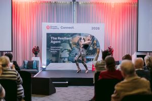 Audience watches a stage presentation at the Private Property Connect 2026 conference, with a screen reading The Resilient Agent.