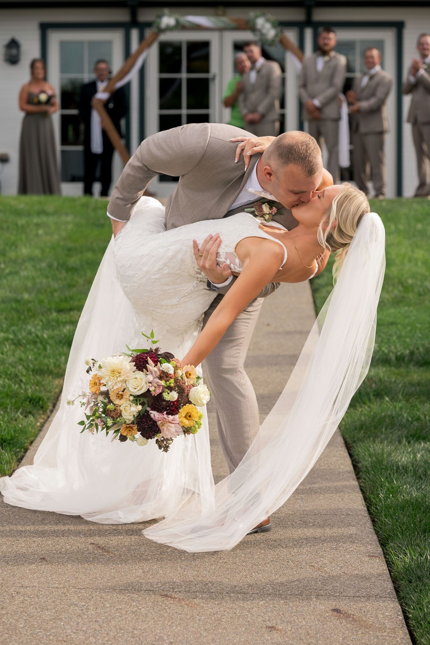 Outdoor lawn wedding ceremony with the historic manor in the background at Little Brook Meadows, Ohio