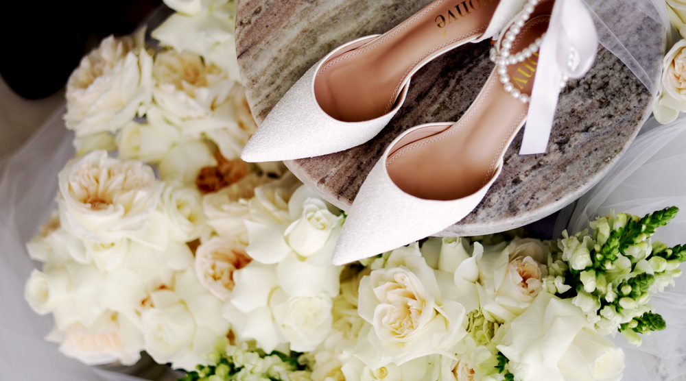 Bridal bouquet featuring beautifully arranged seasonal flowers.