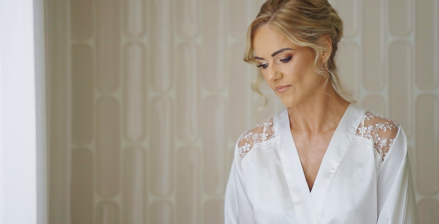 Bride reading a personal letter from the groom on their wedding day.