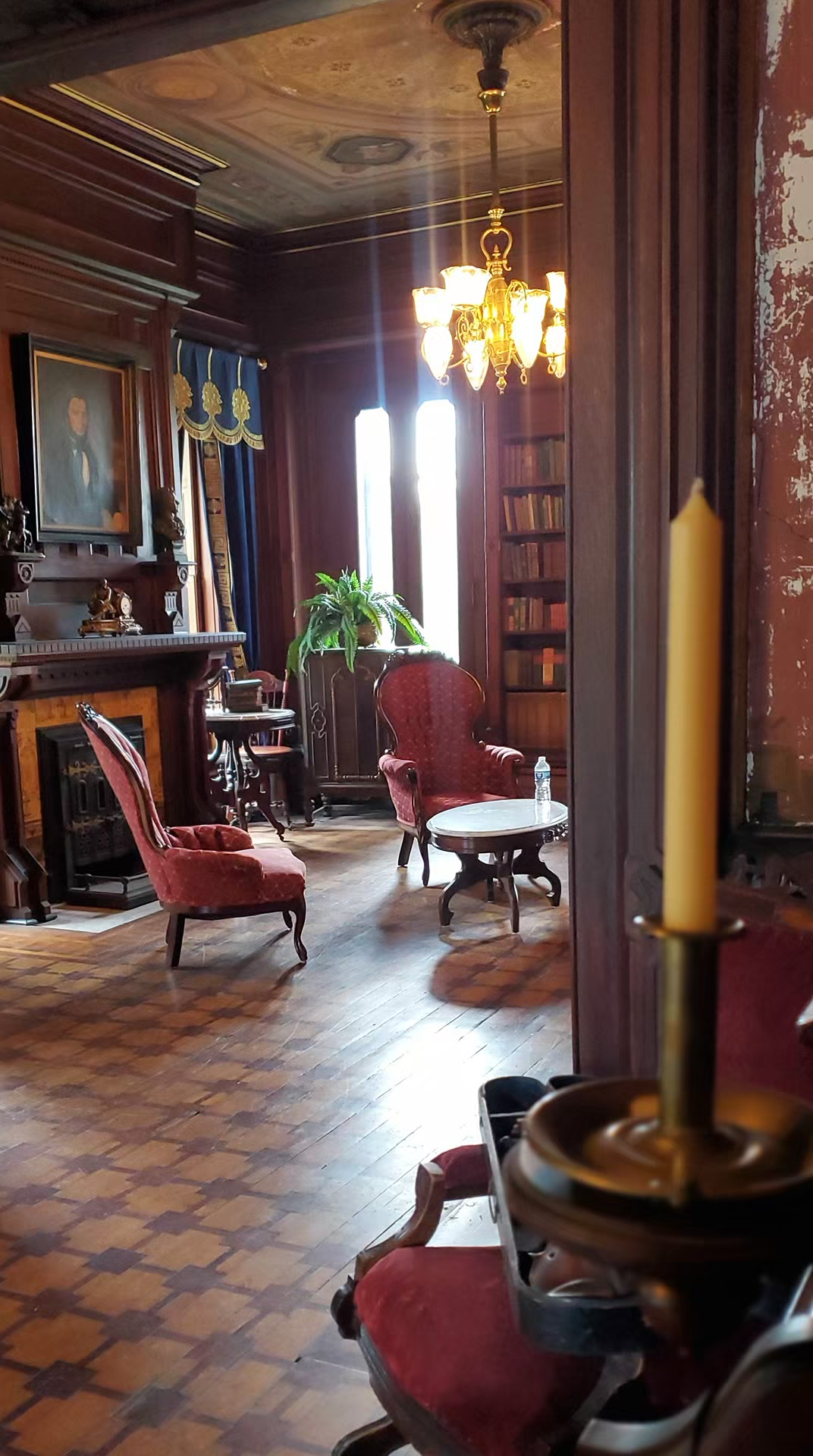 Elegant Victorian library with red velvet chairs at mac-o-chee wedding venue castle