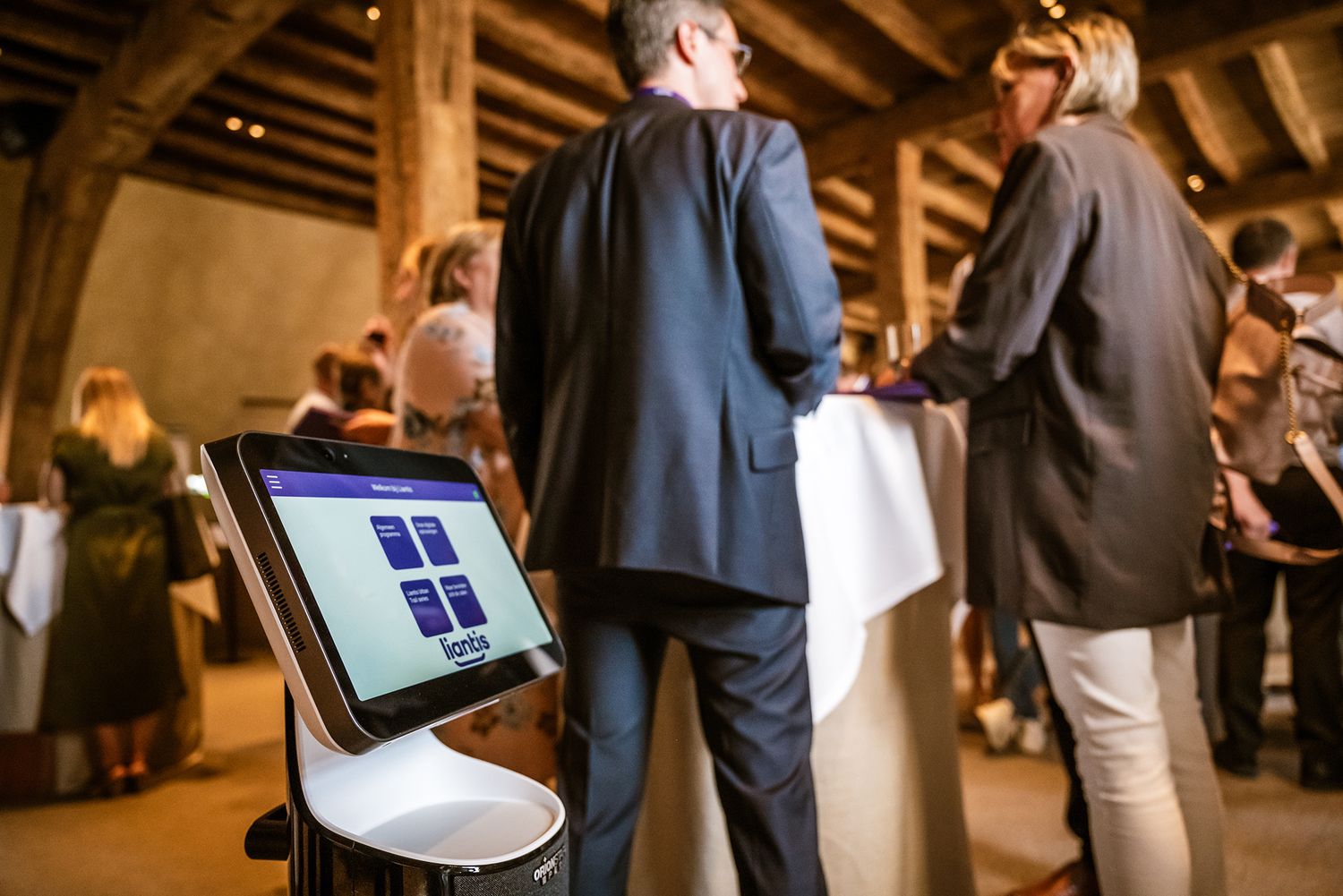 Digitale gastenregistratie met Liantis branding tijdens een zakelijk evenement