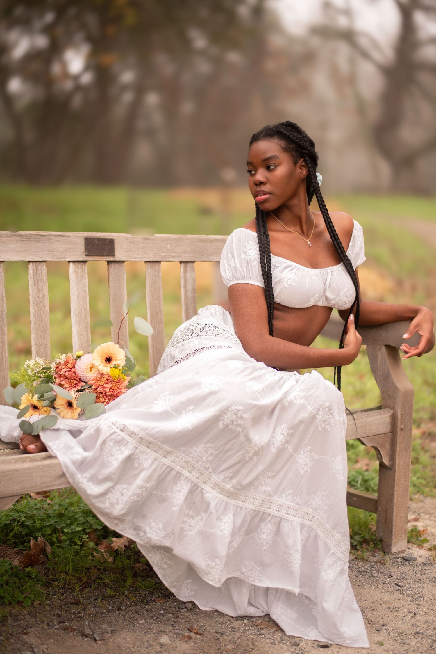 Sonoma County women’s portrait photographer creating natural outdoor portraits surrounded by flowers, soft light, and beautiful California