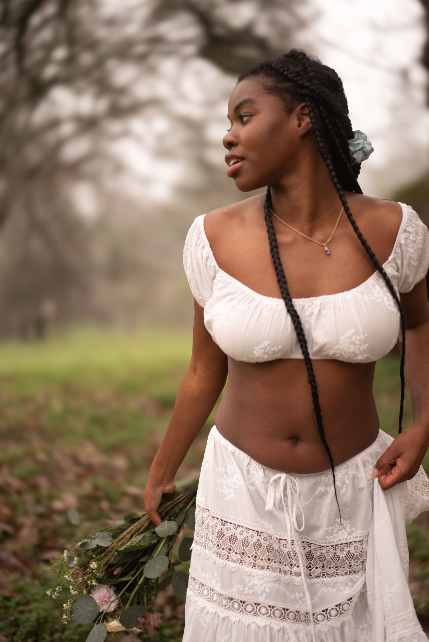 Sonoma County women’s portrait photographer creating natural outdoor portraits surrounded by flowers, soft light, and beautiful California