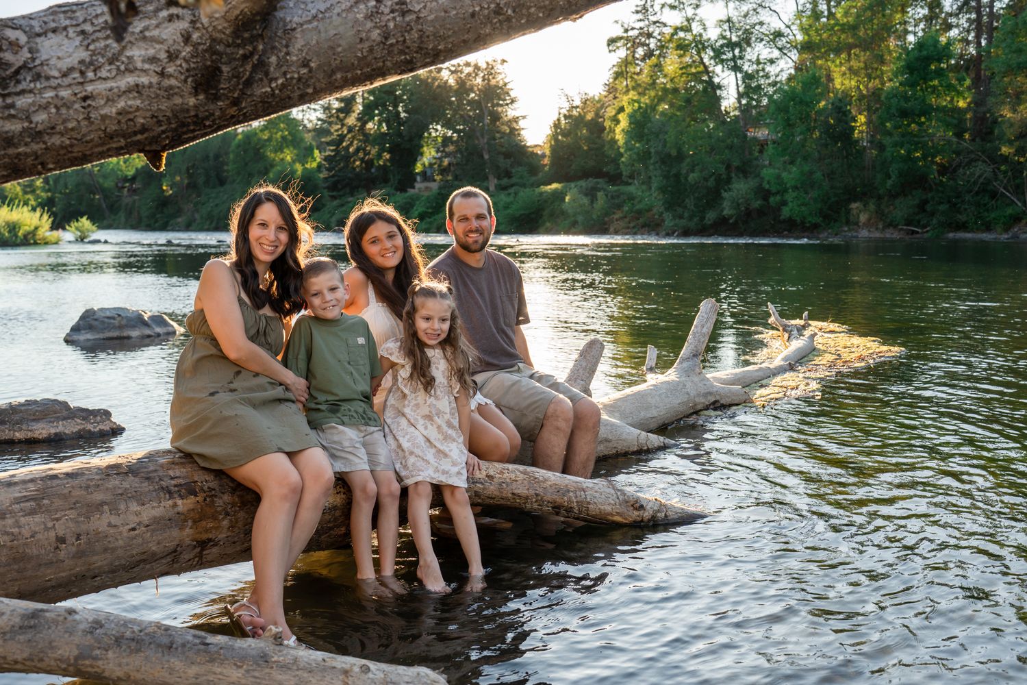 Family portrait in the Rogue River at Rogue River Resort in Southern Oregon