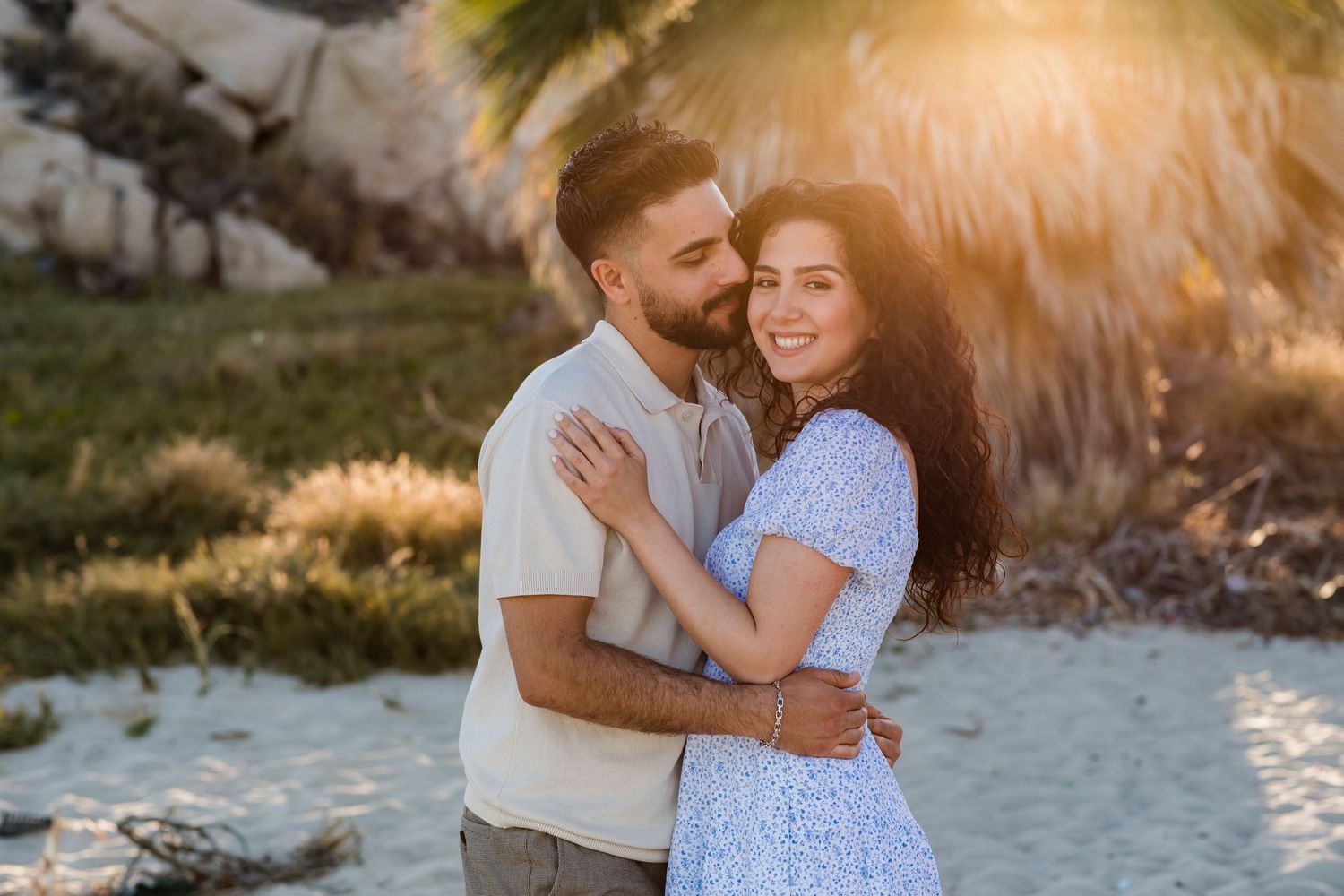 Couple enjoying sunset after wedding ceremony