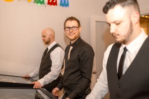 Musicians in formal attire perform at an event.