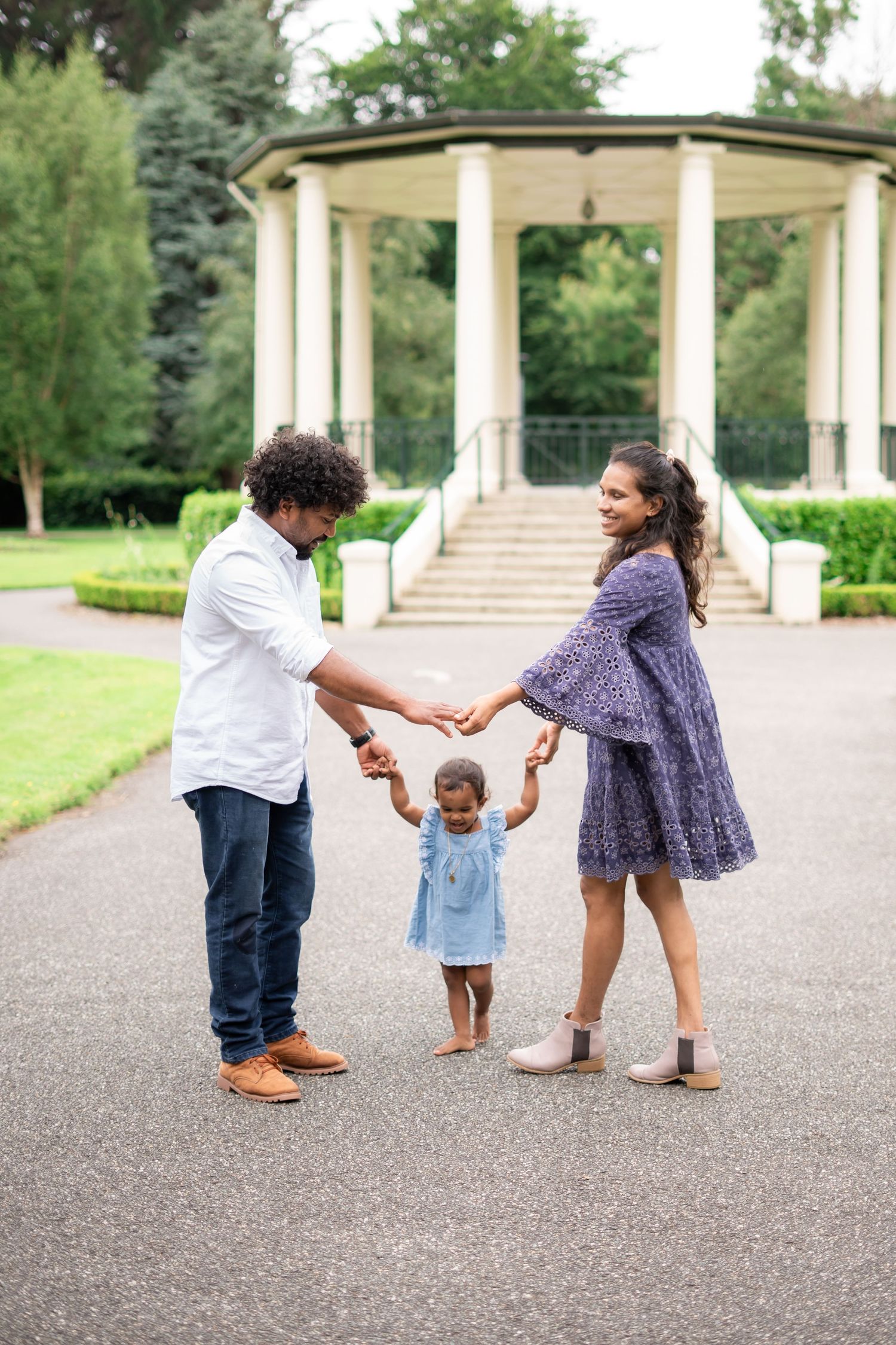 family of three at a park